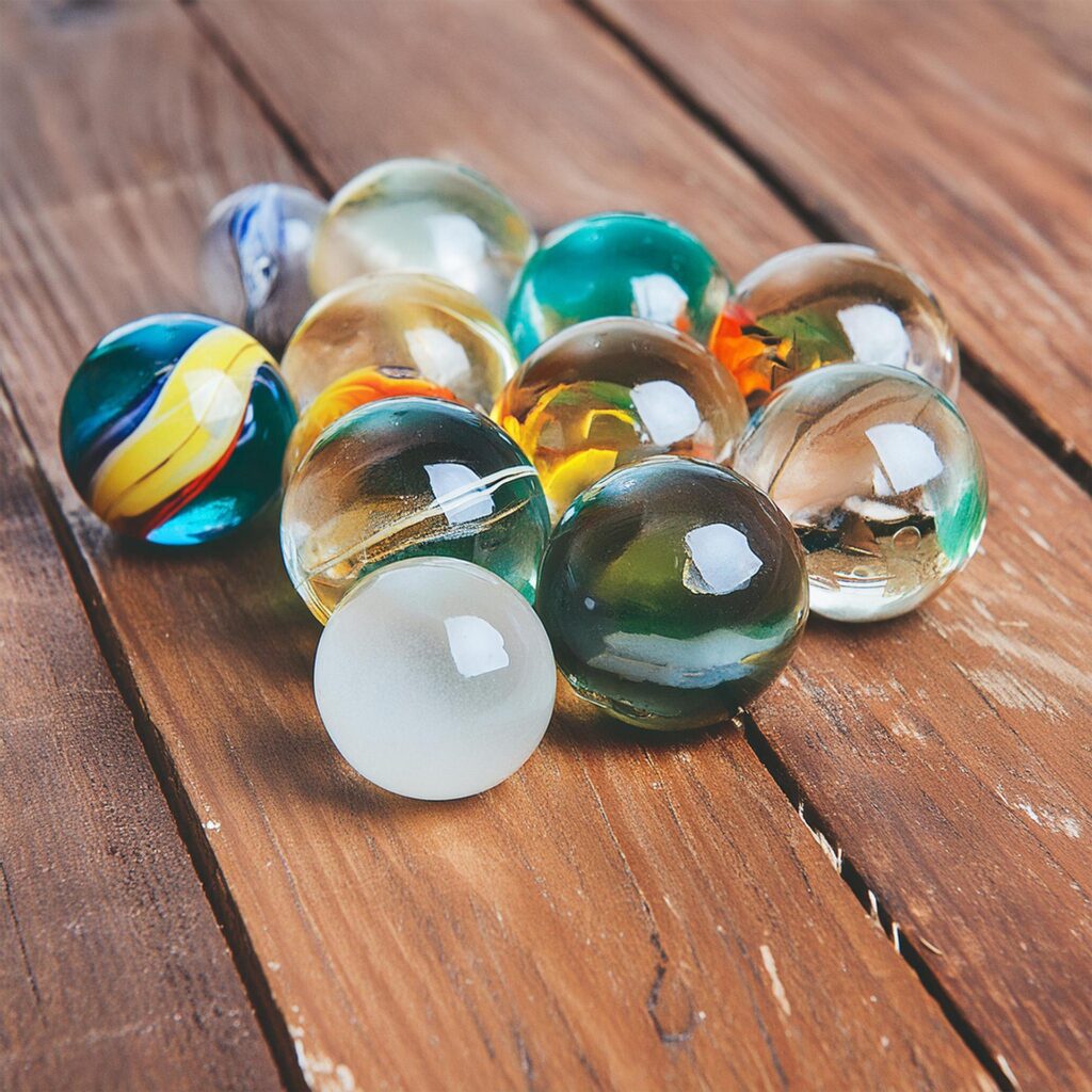 A bunch of marbles on a wooden table